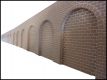 round arches N, high right, sandstone-red